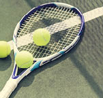 Tennis balls on a tennis court