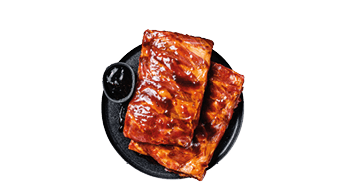 Ready for BBQ raw pork spare ribs with barbecue sauce. Isolated on white background